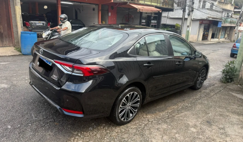 
								COROLLA ALTIS PREMIUM HIBRID 21/22 cheio									