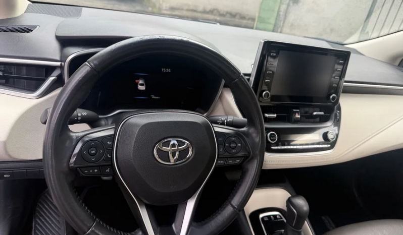 
								COROLLA ALTIS PREMIUM HIBRID 21/22 cheio									