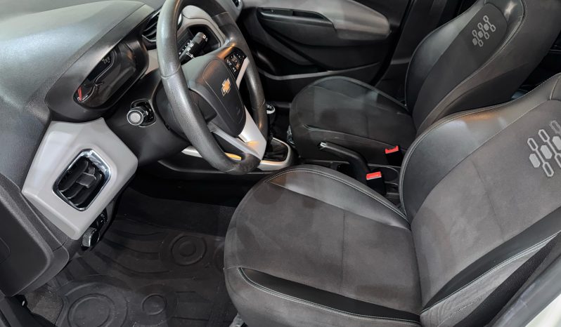 
								Onix Lt 1.0 2019 cheio									