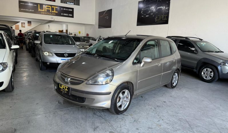 
								honda fit cheio									