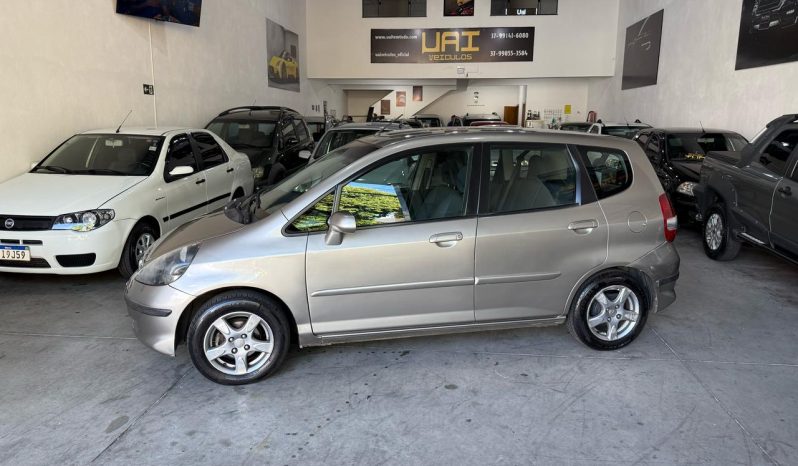 
								honda fit cheio									
