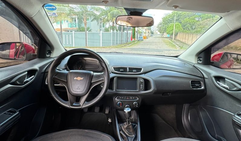 
								Onix Lt 1.0 cheio									