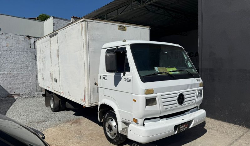 
								Caminhão 7110 cheio									
