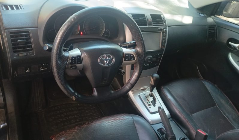 
								Toyota Corolla cheio									