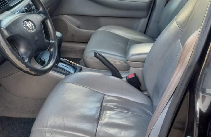 
								Toyota Corolla 1.8 2008 cheio									