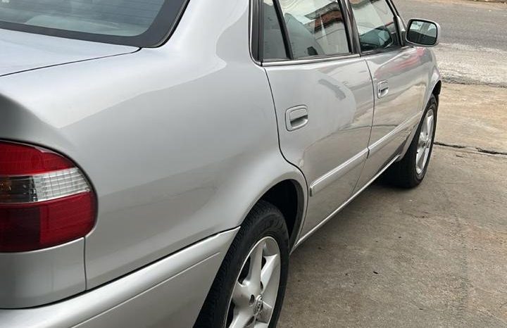 
								COROLLA 1.8 2001 X cheio									